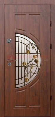 Стальная коричневая дверь с виноритом и ковкой ДВТ-82 в Лыткарино